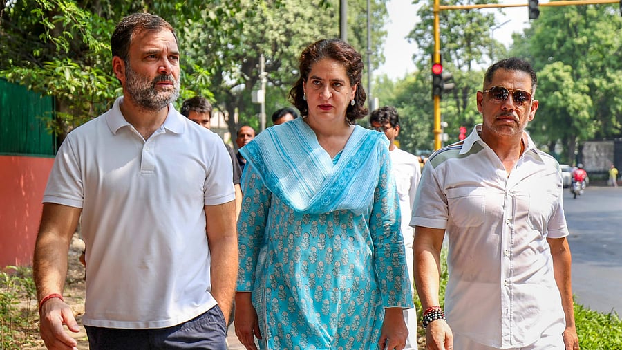<div class="paragraphs"><p>Congress leader Priyanka Gandhi with her husband Robert Vadra and brother Rahul Gandhi.</p></div>