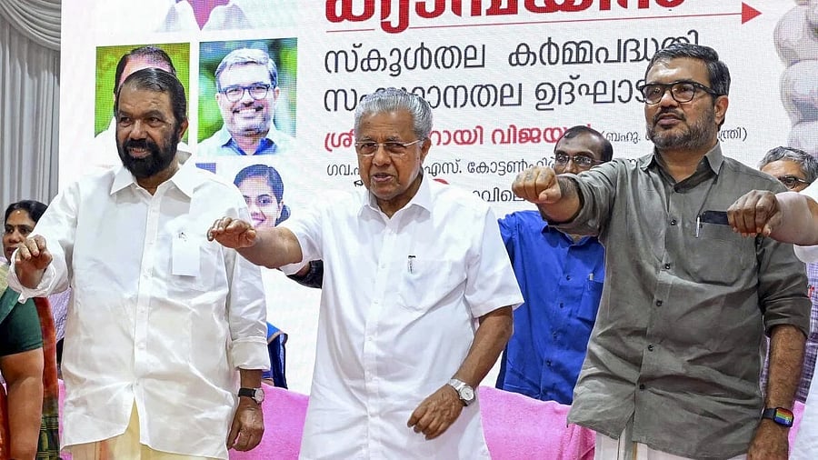 <div class="paragraphs"><p>Kerala Chief Minister Pinarayi Vijayan with Ministers V Sivankutty and MB Rajesh </p></div>