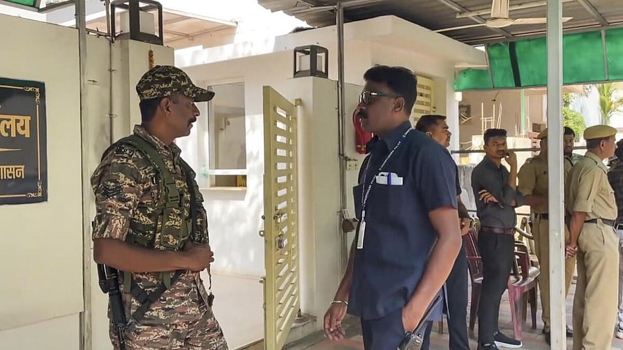 <div class="paragraphs"><p>Security personnel stand guard during raids by the Enforcement Directorate (ED) on premises linked to Chaitanya Baghel, son of former Chhattisgarh Chief Minister and Congress leader Bhupesh Baghel, in connection with an alleged liquor scam, in Bhilai.</p></div>