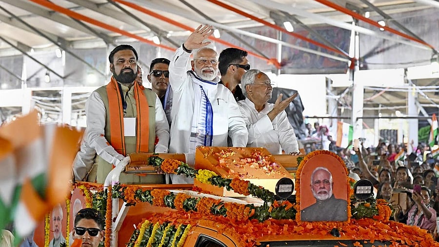 <div class="paragraphs"><p>Prime Minister Narendra Modi with Bihar Chief Minister Nitish Kumar and Deputy Chief Minister Samrat Choudhary during the inauguration and foundation stone laying ceremony of various developmental projects, in Motihari, Bihar.</p></div>
