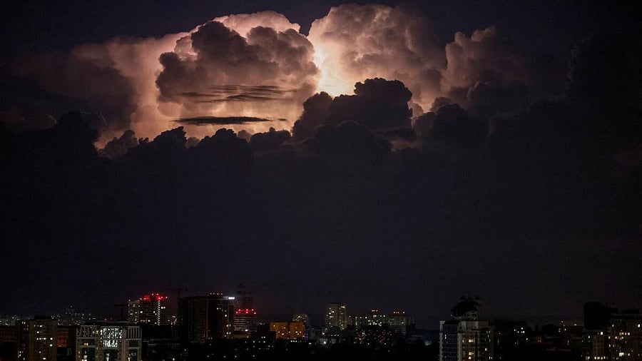 <div class="paragraphs"><p>Lightning illuminates sky during air raid alert in Kyiv.</p></div>