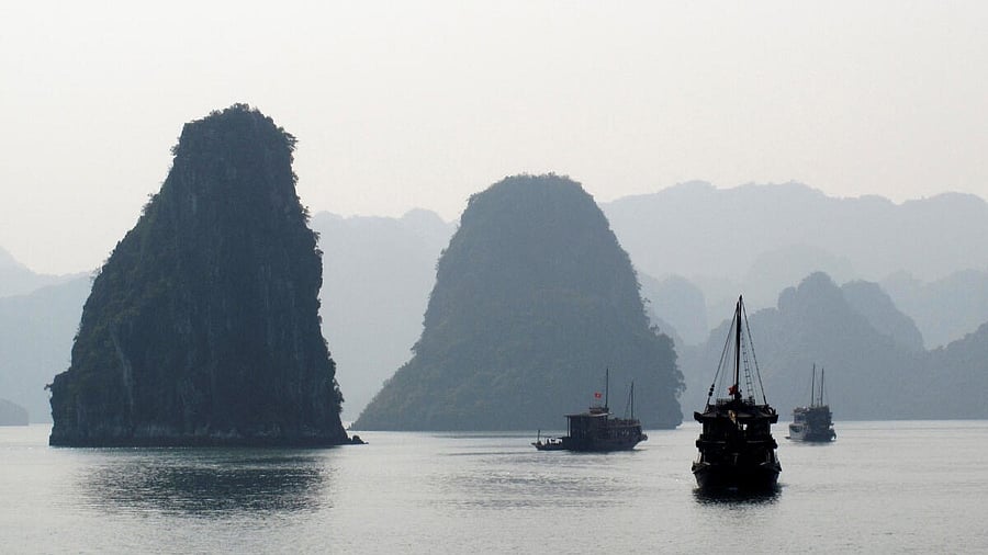<div class="paragraphs"><p>FILE PHOTO: Tourist boats cruise in Halong Bay.&nbsp;</p></div>