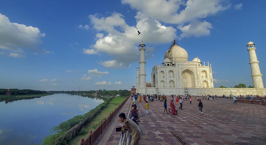 <div class="paragraphs"><p>Visitors at the Taj Mahal complex on the banks of the Yamuna river, in Agra</p></div>