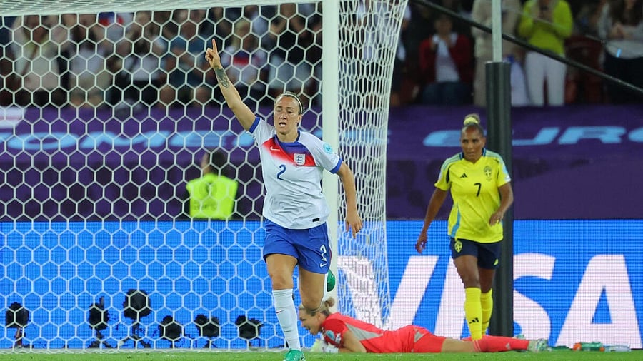 <div class="paragraphs"><p>England's Lucy Bronze celebrates scoring their first goal.</p></div>