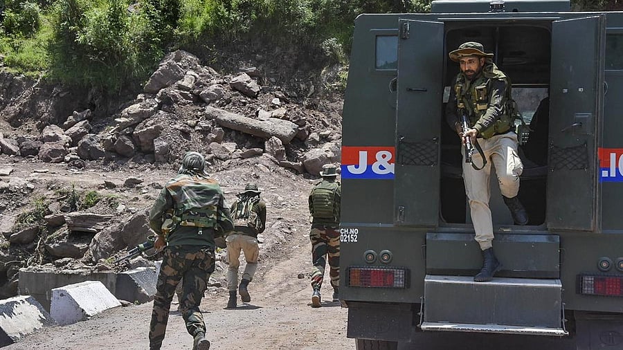 <div class="paragraphs"><p>Security personnel during a cordon and search operation.</p></div>