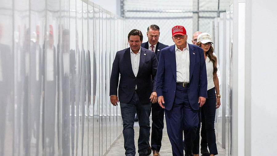<div class="paragraphs"><p> US President Donald Trump, Florida Governor Ron DeSantis and US Homeland Security Secretary Kristi Noem visit a temporary migrant detention center informally known as "Alligator Alcatraz" in Ochopee, Florida.</p></div>