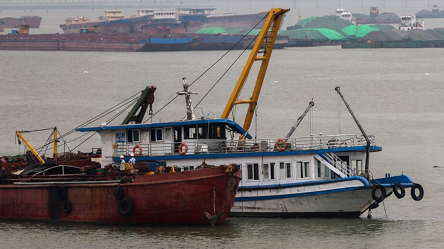 <div class="paragraphs"><p>A tourist boat (in white) that capsized in an accident which killed dozens and left several people still missing, is towed back to the port in Halong Bay, Quang Ninh province, Vietnam, July 20, 2025.</p></div>