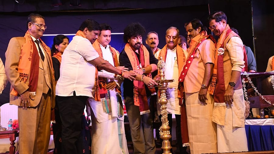 Music director Gurukiran Shetty, former minister Pramod Madhwaraj and educationist Soundarya P Manjappa at 'Tulu Parba' on Sunday. DH PHOTO 
