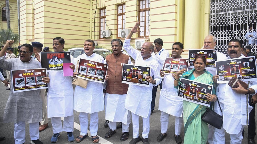 <div class="paragraphs"><p>Congress legislators stage a protest during the first day of the Monsoon session of Bihar Assembly, in Patna, Monday, July 21, 2025.</p></div>