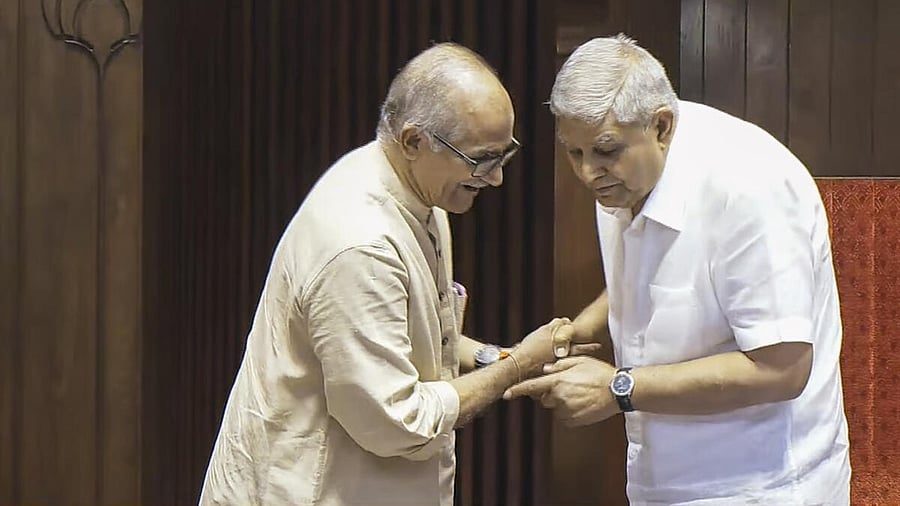 <div class="paragraphs"><p>New Delhi: Rajya Sabha Chairman Jagdeep Dhankhar being greeted by newly sworn-in Rajya Sabha member C. Sadanandan Master after he took oath during the first day of the Monsoon session of Parliament, in New Delhi, Monday, July 21, 2025.</p></div>