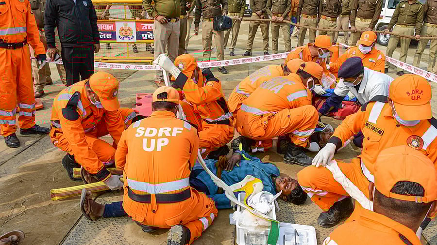 <div class="paragraphs"><p>SDRF and police personnel during a joint mock drill conducted as part of preparedness in case of stampede, ahead of Maha Kumbh Mela 2025, at Sangam, in Prayagraj, Friday, Dec. 27, 2024. </p></div>