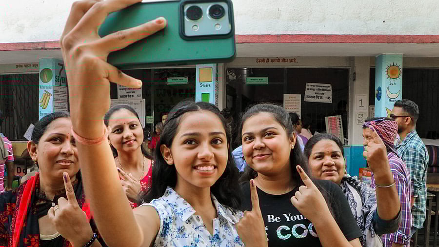 <div class="paragraphs"><p>First time voters take selfie after casting votes for the first phase of Lok Sabha polls, 2024. Image for representational purposes.</p></div>