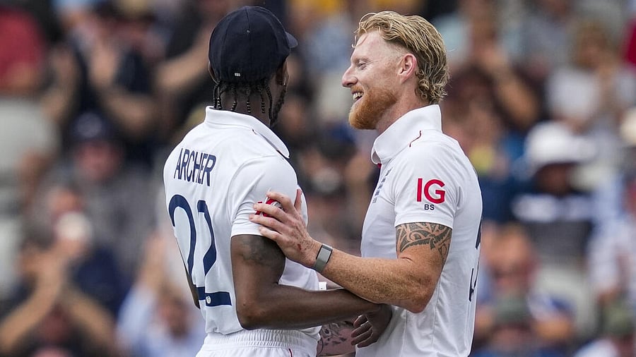 <div class="paragraphs"><p>England's captain Ben Stokes celebrates with Jofra Archer after taking the wicket of India’s Anshul Kamboj.</p></div>