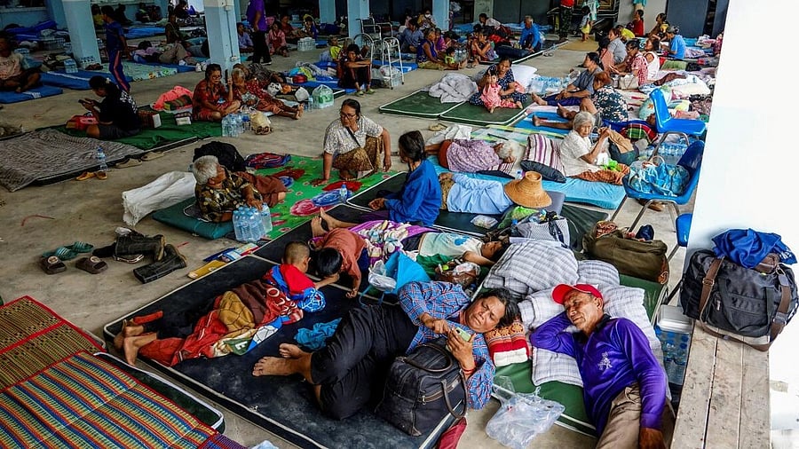 <div class="paragraphs"><p>People rest at a shelter, following recent clashes along the disputed border between the two countries, according to authorities people have been killed across three border provinces, in Surin province, Thailand.</p></div>