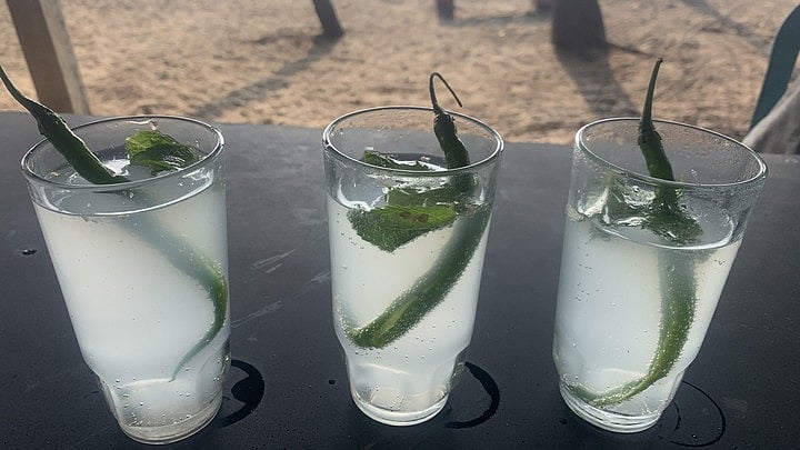 <div class="paragraphs"><p>A glass of goan urrak or feni. </p></div>