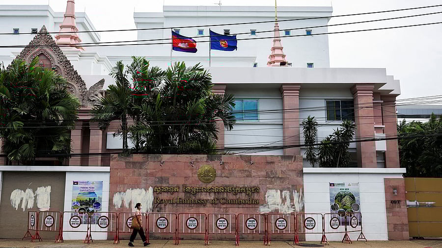 <div class="paragraphs"><p>A woman walks past the Royal Embassy of Cambodia, after Thailand recalled its ambassador to Cambodia and said it would expel Cambodia's ambassador, following a landmine incident that injured Thai soldiers and recent clashes along the disputed border between the two countries, in Bangkok, Thailand, July 24, 2025.</p></div>