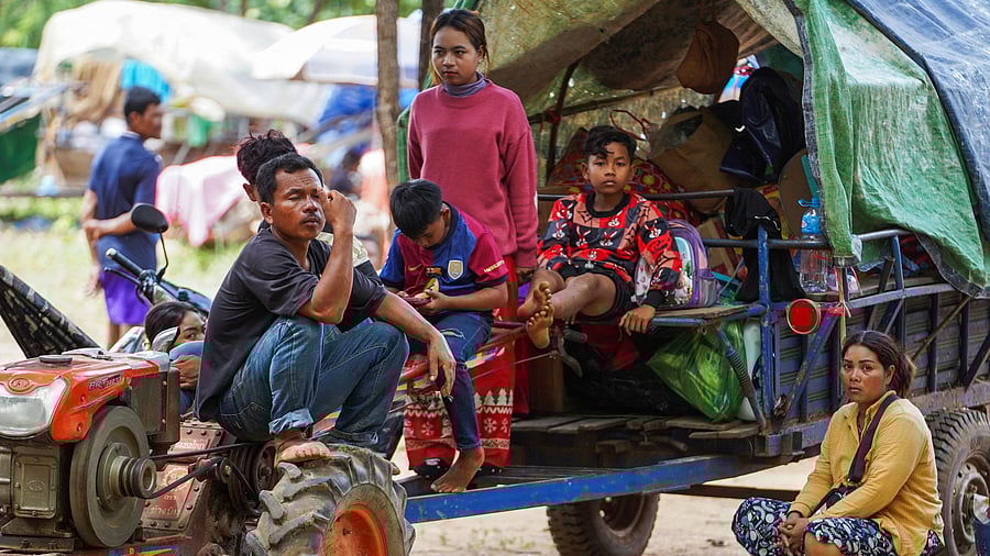 <div class="paragraphs"><p>People, evacuating from Pong Tuek village, in Banthey Empel district, around 20 km (12 miles) from the disputed Ta Moan Thom temple, rest at a temporary shelter, after Thailand scrambled an F-16 fighter jet to bomb targets in Cambodia following artillery volleys from both sides that killed civilians, in Oddar Meachey province, Cambodia.</p></div>