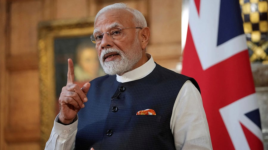 <div class="paragraphs"><p>Prime Minister Narendra Modi of India gestures during a press conference with Britain's Prime Minister Keir Starmer (not pictured) after signing a free trade agreement at Chequers near Aylesbury, England.</p></div>