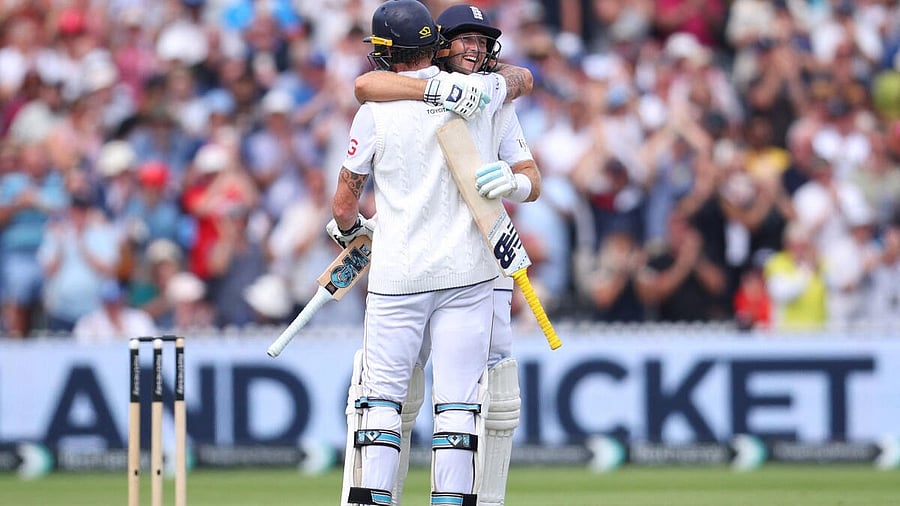 <div class="paragraphs"><p>England's Joe Root celebrates after reaching his century with Ben Stokes</p></div>