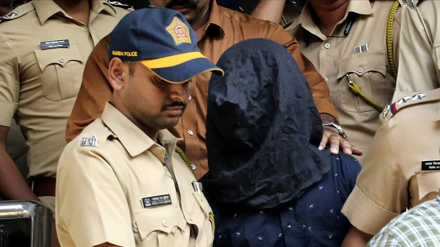 <div class="paragraphs"><p>File Photo: Police personnel take the accused, arrested in connection with the alleged attack on Bollywood actor Saif Ali Khan, to a hospital for medical examination before producing him at a court, in Mumbai.</p></div>