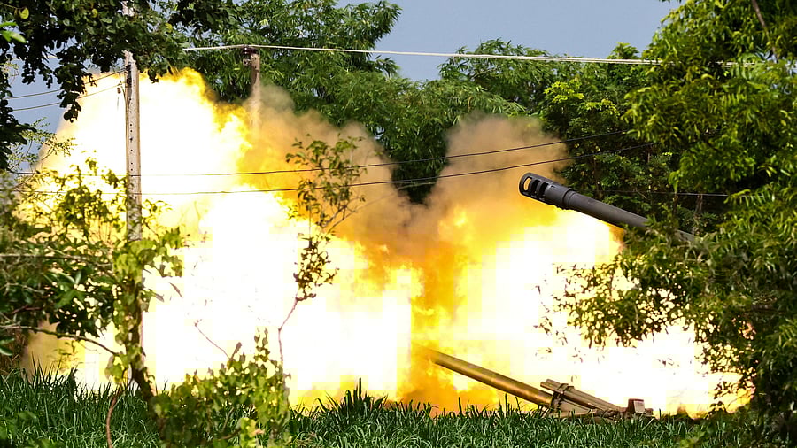 <div class="paragraphs"><p>A Thailand's mobile artillery unit fires towards Cambodia's side after Thailand and Cambodia exchanged heavy artillery on Friday as their worst fighting in more than a decade stretched for a second day, in Surin, Thailand, July 25, 2025.</p></div>