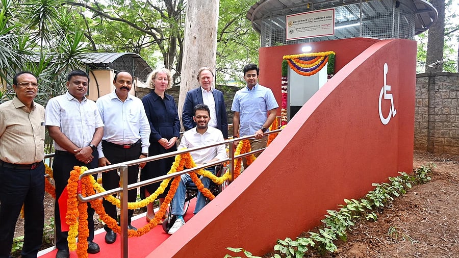 <div class="paragraphs"><p>Prateek Khandelwal, Founder of RampMyCity (seated), Tejasvi Surya, Member of Parliament (Bangalore South), Philip Green, Australian High Commissioner to India and Hilary McGeachy, Australian Consul-General, with others at the inauguration of a disability-accessible washroom at Lalbagh on Saturday.</p></div>