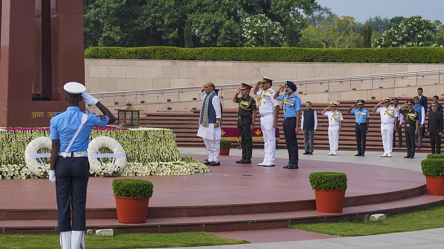 <div class="paragraphs"><p>Defence Minister Rajnath Singh with Vice Chief of the Army Staff Lt. General N.S. Raja Subramani, Chief of the Naval Staff Admiral Dinesh K Tripathi and Chief of the Air Staff Air Chief Marshal AP Singh pays tribute to the Kargil War martyrs at the National War Memorial on the 26th anniversary of the 'Kargil Vijay Diwas', in New Delhi, Saturday, July 26, 2025.</p></div>