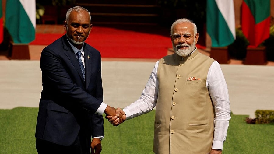 <div class="paragraphs"><p>Maldives' President Mohamed Muizzu shakes hands with Indian Prime Minister Narendra Modi </p></div>