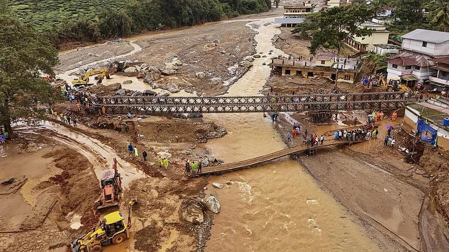 <div class="paragraphs"><p>Army personnel during the construction of a bailey bridge at Chooralmala area as part of a rescue operation after a landslide triggered by heavy rainfall, in Wayanad</p></div>