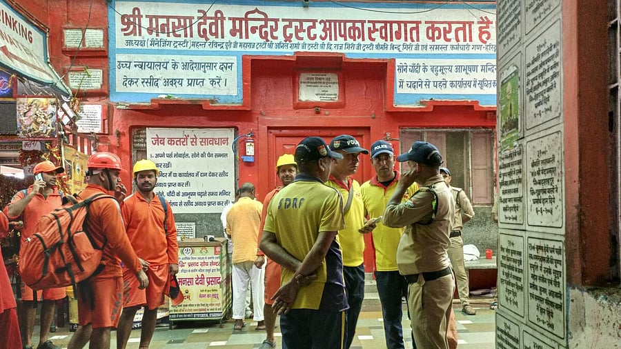 <div class="paragraphs"><p>Police and SDRF personnel at the site after a stampede broke out at Mansa Devi temple, in Haridwar, Uttarakhand.</p></div>