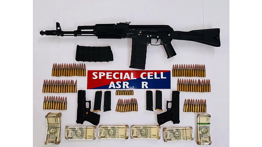 <div class="paragraphs"><p>Police have seized an AK Saiga 308 assault rifle, two magazines, two 9 mm Glock pistols with four magazines, 90 live cartridges of AK rifle, 10 live pistol cartridges, Rs 7.50 lakh in cash, a car and three mobile phones from the possession of the accused.</p></div>