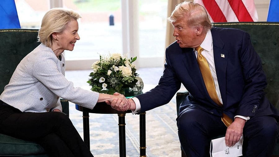 <div class="paragraphs"><p>US President Donald Trump shakes hands with European Commission President Ursula von der Leyen, after an announcement of a trade deal between the US and EU, in Turnberry, Scotland, Britain.</p></div>