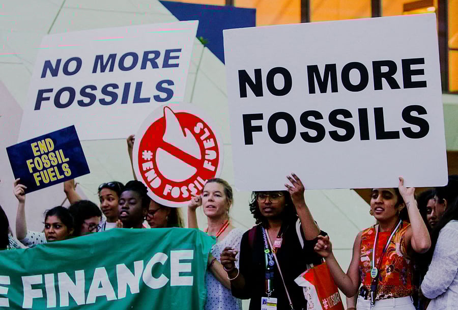 <div class="paragraphs"><p>FILE PHOTO: Climate activists protest against fossil fuels at Dubai's Expo City during the United Nations Climate Change Conference COP28 in Dubai, United Arab Emirates, December 12, 2023.</p></div>