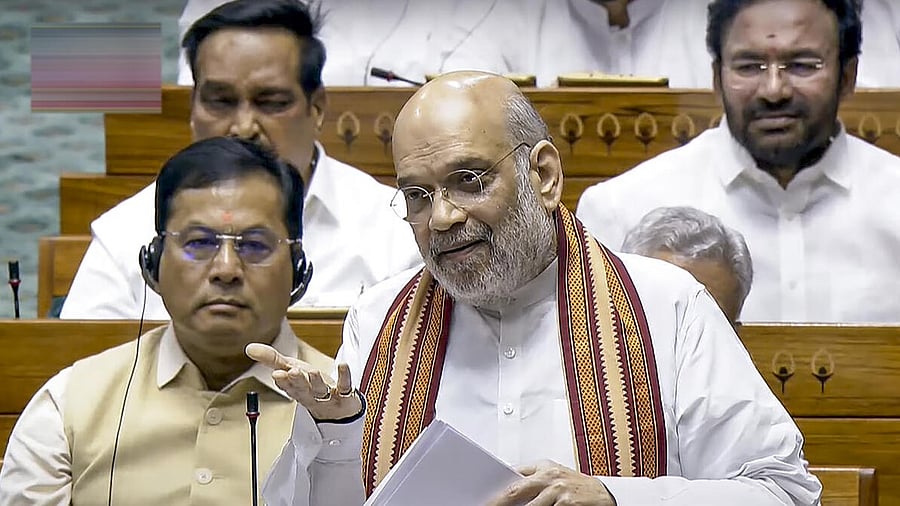 <div class="paragraphs"><p>Union Home Minister Amit Shah speaks during a debate in the Lok Sabha on the Pahalgam terror attack and Operation Sindoor, at the Monsoon session of Parliament, in New Delhi, Tuesday, July 29, 2025.</p></div>