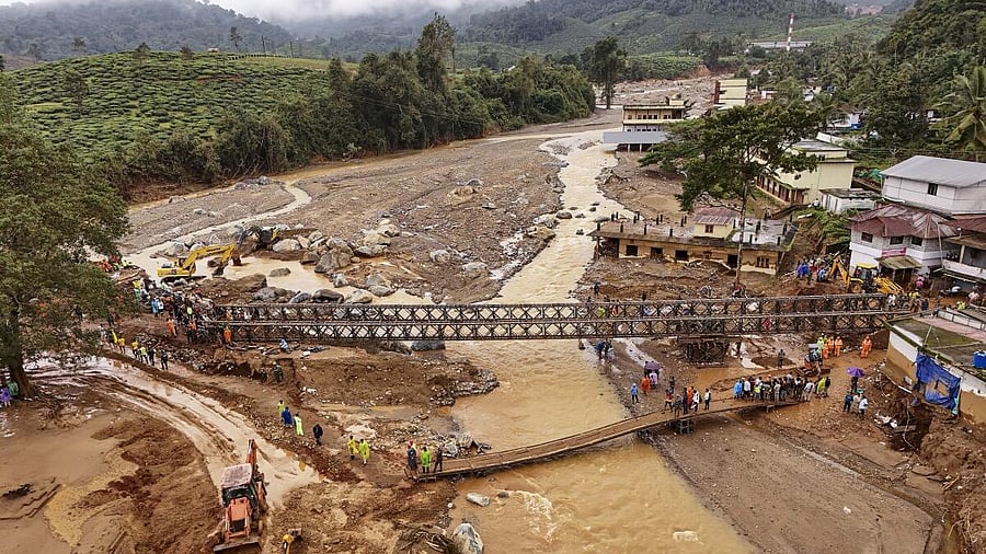 <div class="paragraphs"><p>Army personnel during the construction of a bailey bridge at Chooralmala area as part of a rescue operation after a landslide triggered by heavy rainfall, in Wayanad district, Thursday, Aug. 1, 2024.</p></div>
