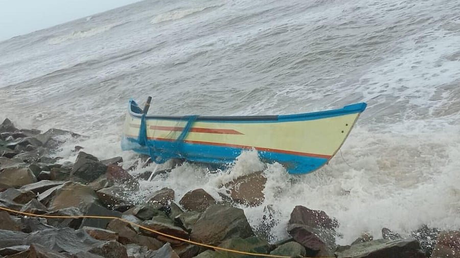 <div class="paragraphs"><p>The fishing boat which collided with a sea wall near Alvekodi in Bhatkal taluk of Uttara Kannada district.</p></div>