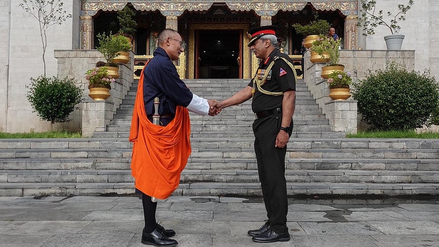 <div class="paragraphs"><p>Bhutan PM Tshering Tobgay meets with Lieutenant General Raghu Srinivasan, Director General of the Border Roads Organisation.</p></div>