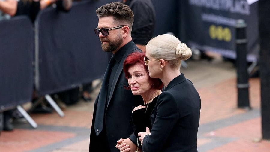 <div class="paragraphs"><p>Sharon Osbourne, Kelly Osbourne and Jack Osbourne walk as people gather for the funeral cortege of Ozzy Osbourne, the former Black Sabbath frontman, in Birmingham, Britain, July 30, 2025.</p></div>