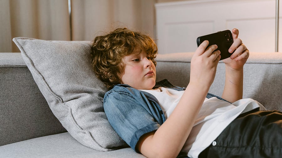 <div class="paragraphs"><p>Kid with a Phone.&nbsp;</p></div>