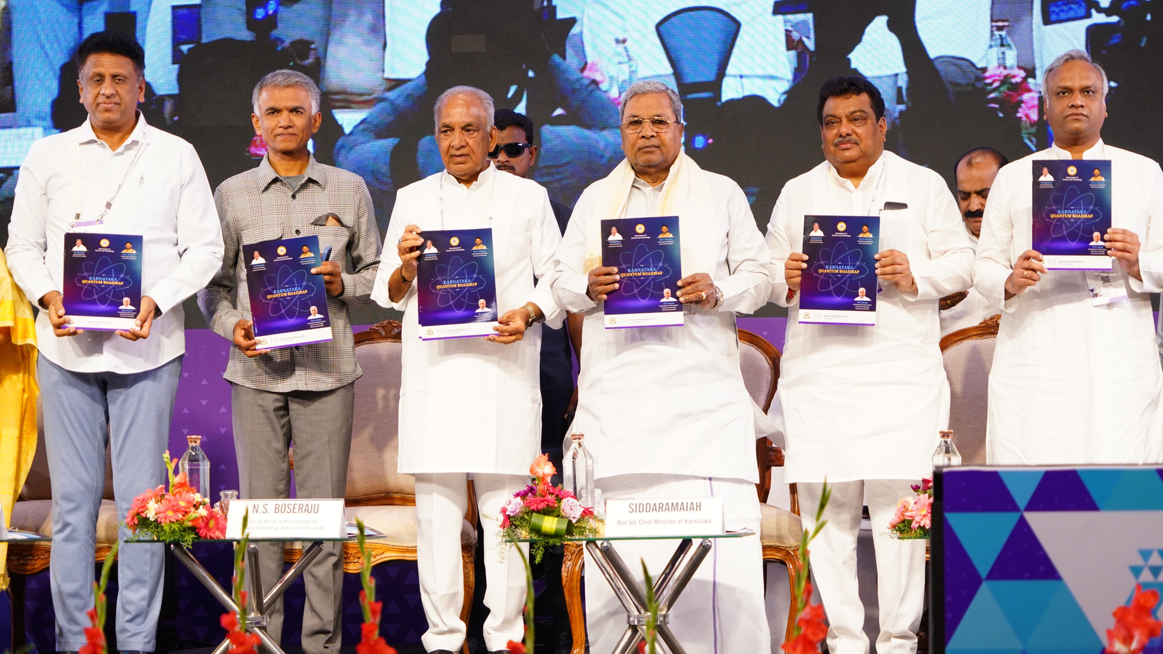 <div class="paragraphs"><p>Ministers MC Sudhakar, Krishna Byre Gowda, NS Boseraju, CM Siddaramaiah, MB Patil and Priyank Kharge at the launch of Karnataka’s Quantum Roadmap, during Quantum India Bengaluru Summit on Thursday.</p></div>