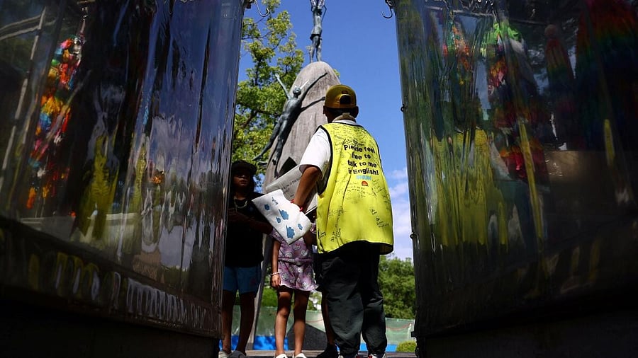 <div class="paragraphs"><p>Shun Sasaki, an elementary school student in Hiroshima, guides foreign visitors at Hiroshima Peace Memorial Park in Hiroshima.</p></div>