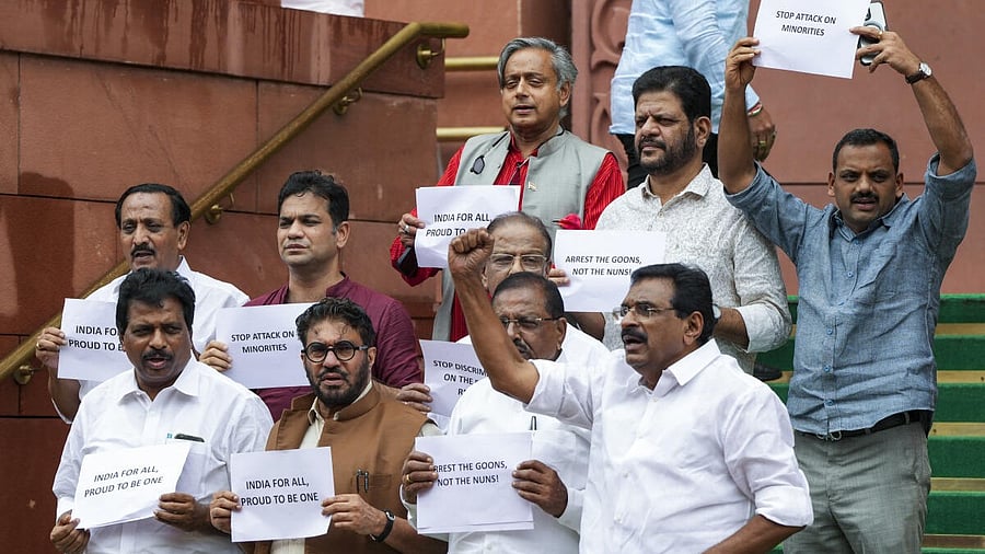 <div class="paragraphs"><p>Congress MP Shashi Tharoor and other MPs from Kerala protest on the issue of nuns arrested in Chhattisgarh, during the Monsoon session of Parliament, in New Delhi, Tuesday, July 29, 2025.</p></div>
