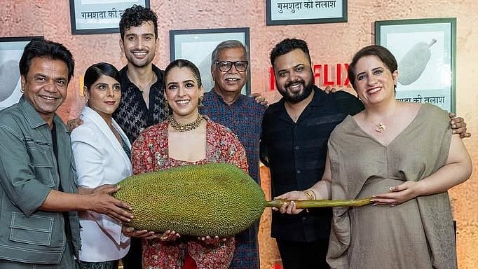 <div class="paragraphs"><p>Producer Guneet Monga poses with <em>Kathal</em> cast and crew.&nbsp;</p></div>