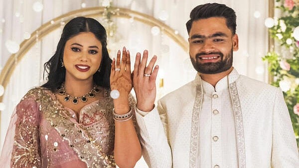 <div class="paragraphs"><p>Samajwadi Party MP Priya Saroj and cricketer Rinku Singh during their engagement, in Lucknow.</p></div>