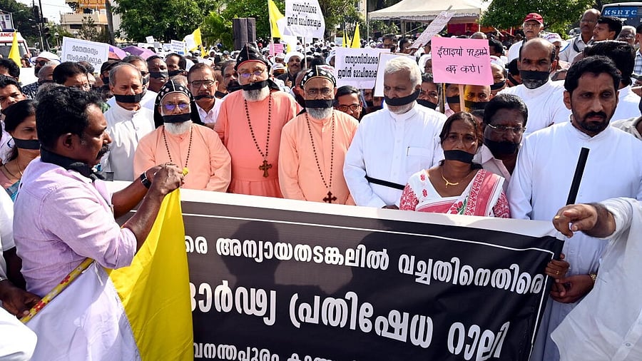 <div class="paragraphs"><p>Catholic Forum members with black cloth over their mouths hold a demonstration against the arrest of two Catholic nuns in BJP-ruled Chhattisgarh.</p></div>