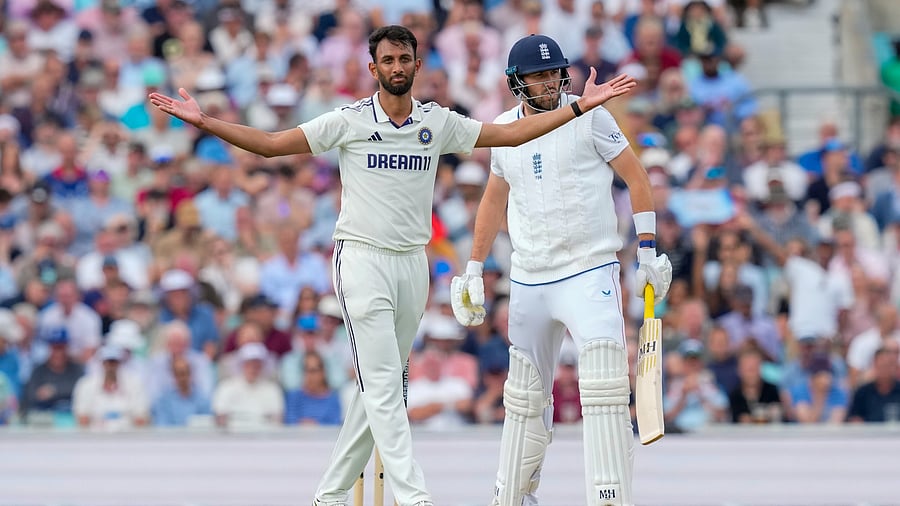 <div class="paragraphs"><p> India's Prasidh Krishna celebrates after taking the wicket of England's Jamie Overton during the second day of the fifth Test cricket at The Oval, August 1, 2025.</p></div>