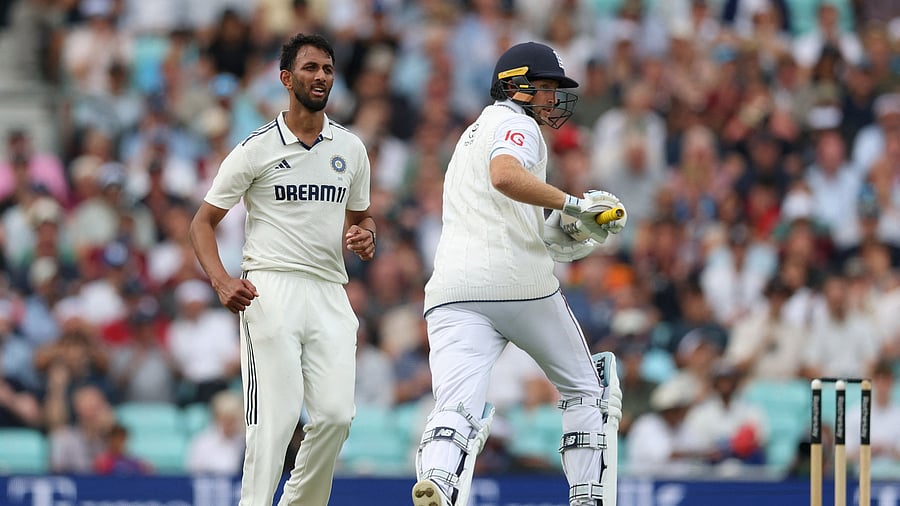 <div class="paragraphs"><p>Prasidh Krishna and Joe Root in action, August 1, 2025.</p></div>