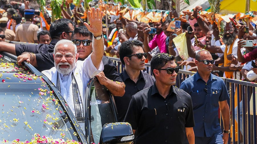 <div class="paragraphs"><p> Prime Minister Narendra Modi during a roadshow at Gangaikonda Cholapuram in Ariyalur district of Tamil Nadu. </p></div>
