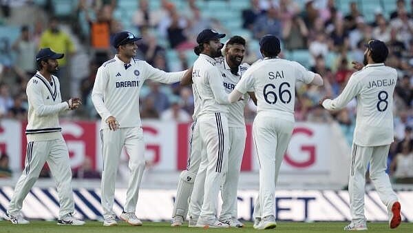 <div class="paragraphs"><p>India's bowler Mohammed Siraj celebrates with teammates after the wicket of England's batter Zak Crawley during the third day of the fifth Test match between India and England, at The Oval cricket ground, in London, England.</p></div>