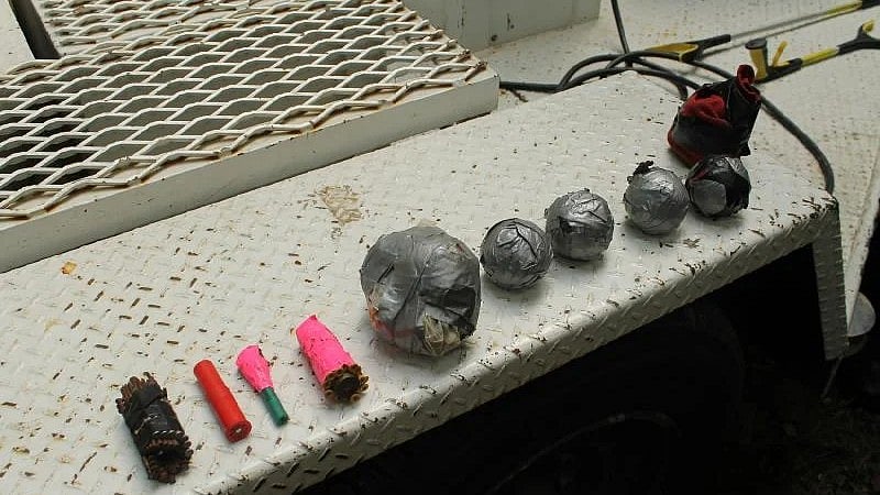 <div class="paragraphs"><p>Officials said they found 14 improvised explosive devices inside O’Neal’s home.</p><p><br></p></div>